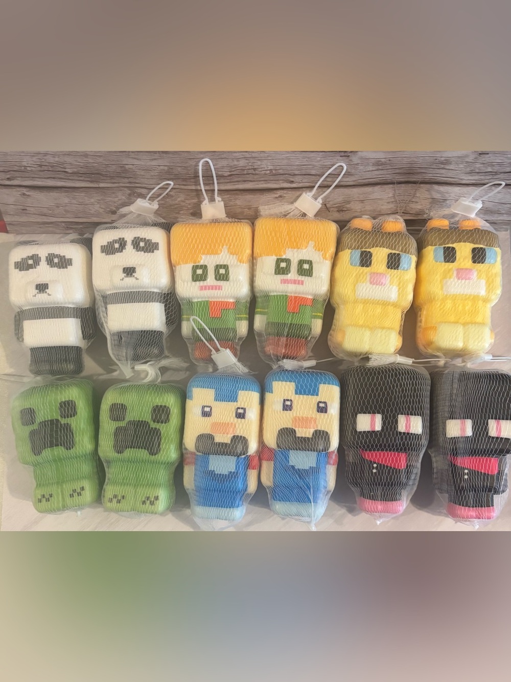 12 ct. Plush Pixel Character Squishy Toy - Yellow & Blue Assortment